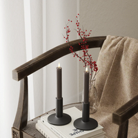 Mixed-height mocha LED dinner candles on a white table with flowers and remote, showing how easily they style together.
