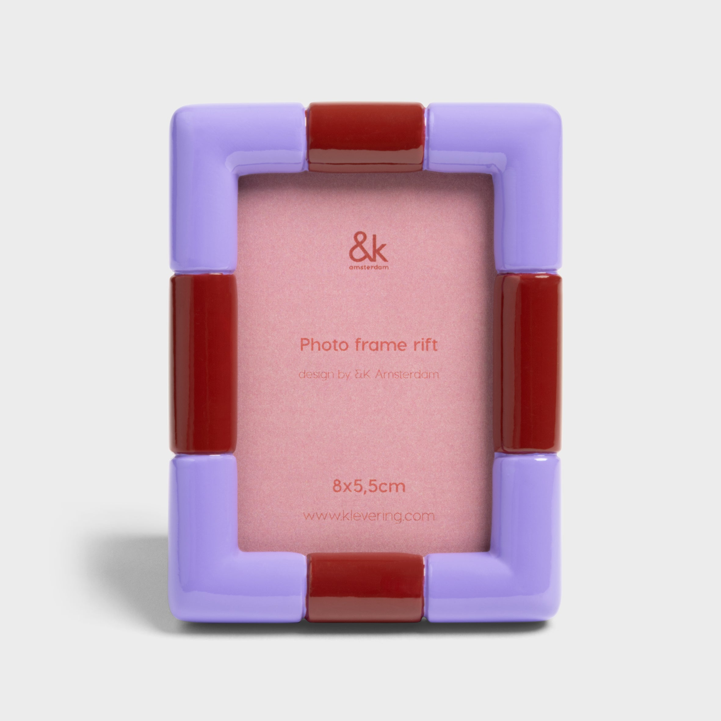 Modern lilac and red rectangular picture frame for 8 x 5.5 cm prints.
