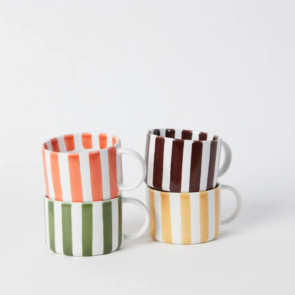 Stacked Monica striped cups by Olsson & Jensen in mixed colours