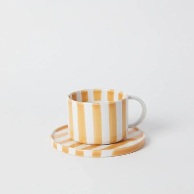 Monica yellow striped stoneware cup and saucer by Olsson & Jensen