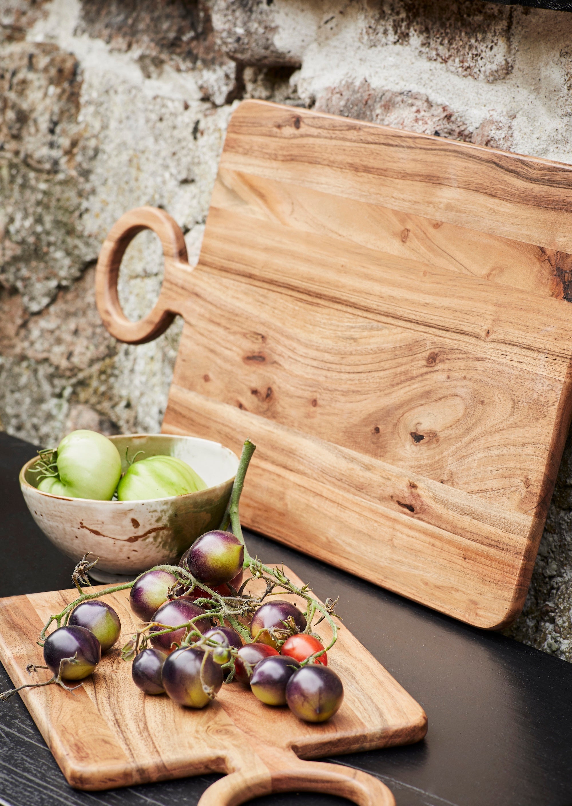 small white and green stoneware bowl in a relaxed Nordic setting with snacks
