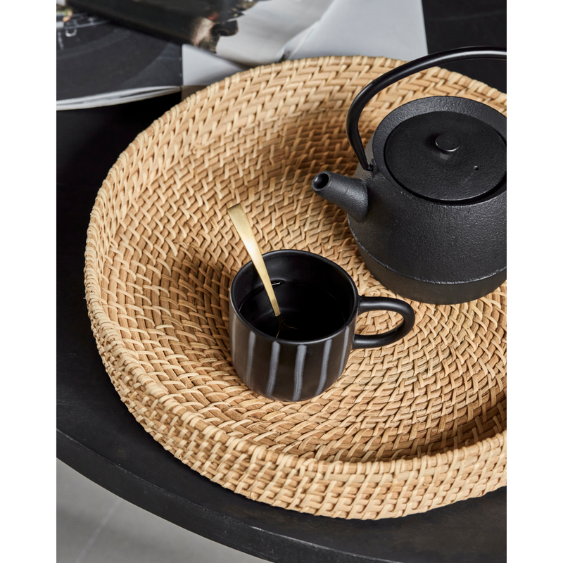 natural rattan house doctor taan tray styled with teapot and cup
