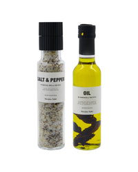 Nicolas Vahé truffle salt and pepper grinder next to a bottle of mushroom and truffle oil