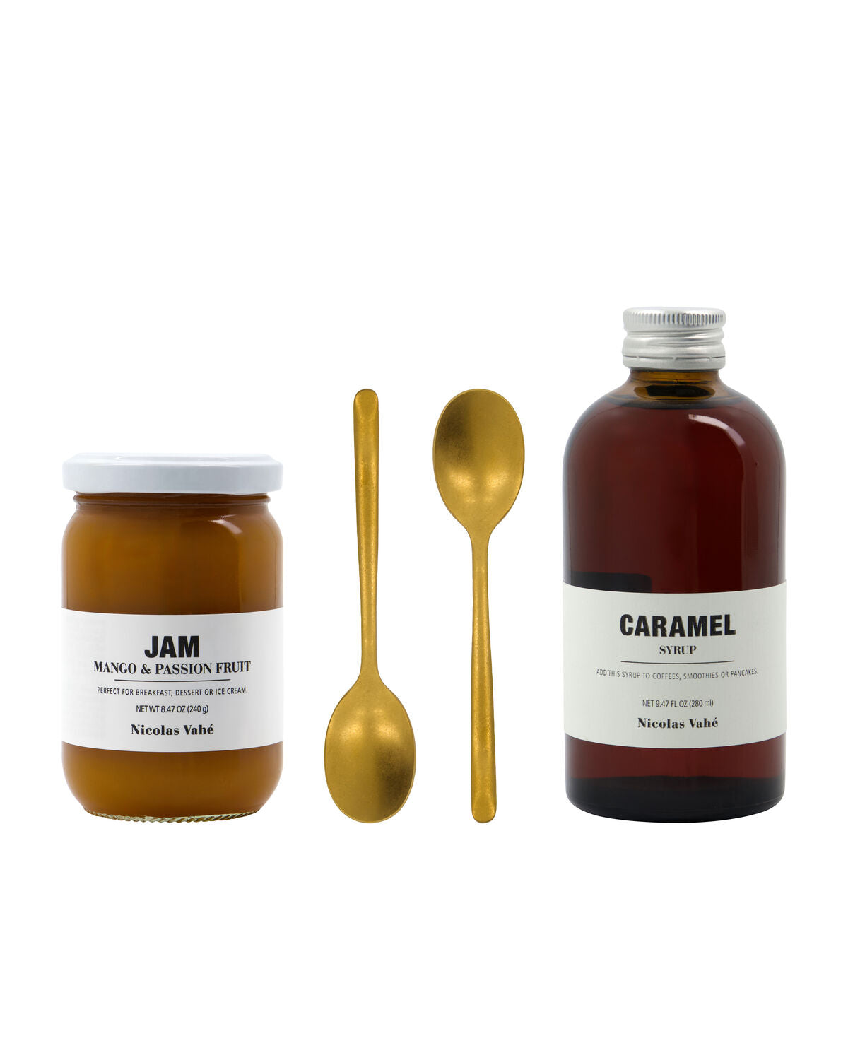 Nicolas Vahé mango and passion fruit jam, gold-finish spoons and caramel syrup bottle