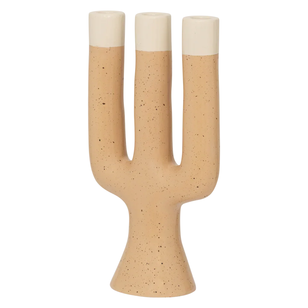 Close view of the speckled apricot finish and cream tips on the Nox candle holder