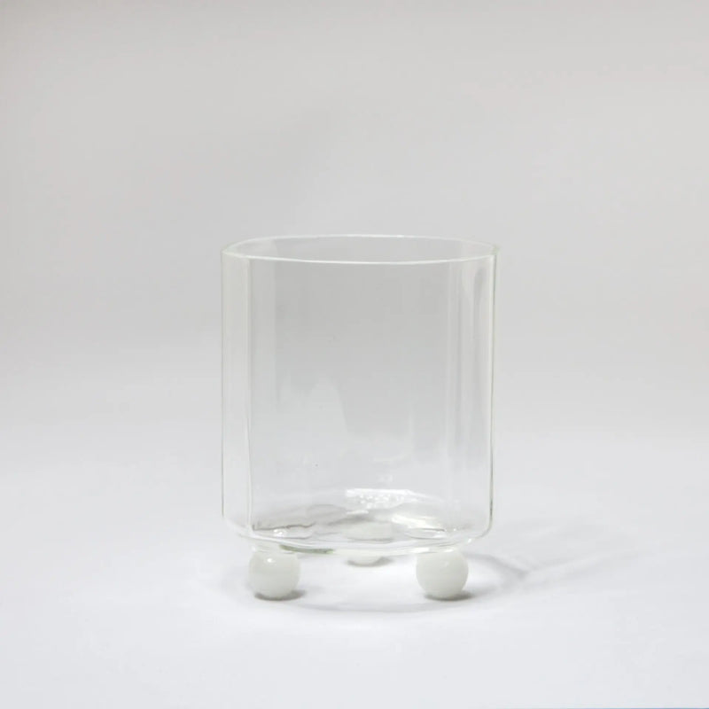 Palermo glass tumbler on three white glass feet by Olsson & Jensen