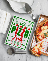 Pizza Tools kit styled with pizza and napkins