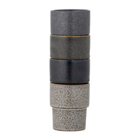 Reactive glaze stoneware cups in assorted tones
