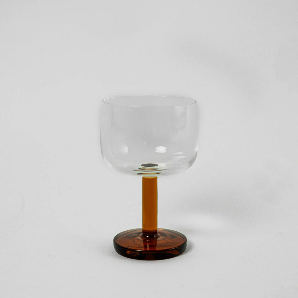 Rio wine glass with an amber stem by Olsson & Jensen