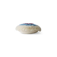 side view of round fluffy HKLIVING cushion showing soft layered wool texture
