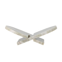 Unique veined marble home accessory combining sculpture and function