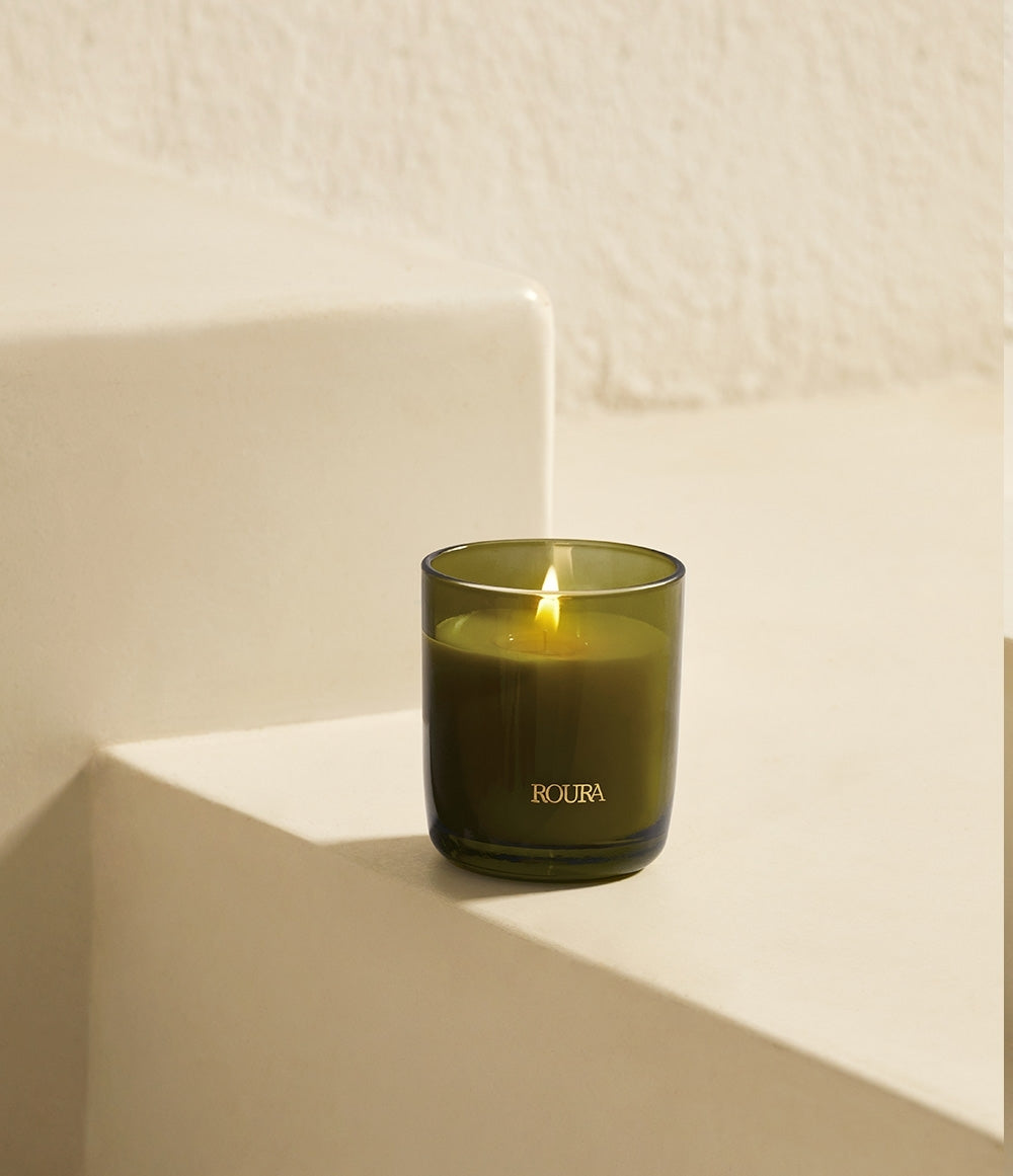 Secret Garden single wick candle in olive green glass with fresh floral fragrance