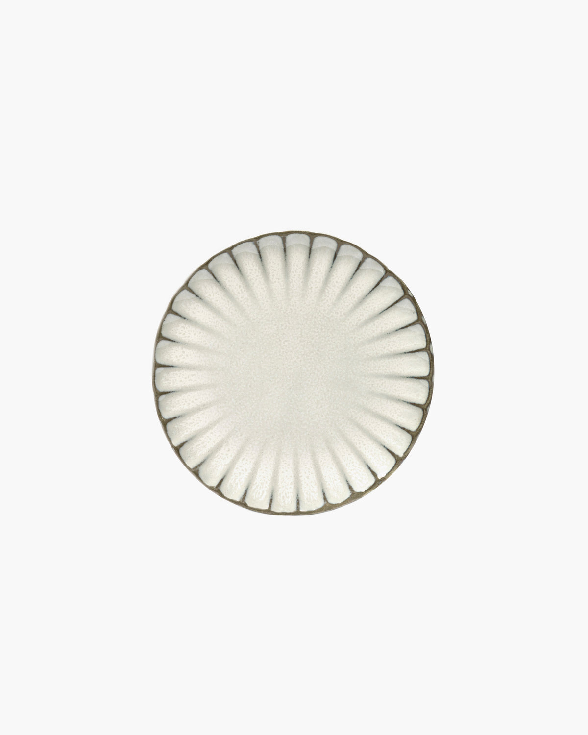 Top view of the white Inku breakfast plate by Serax showing the reactive glaze