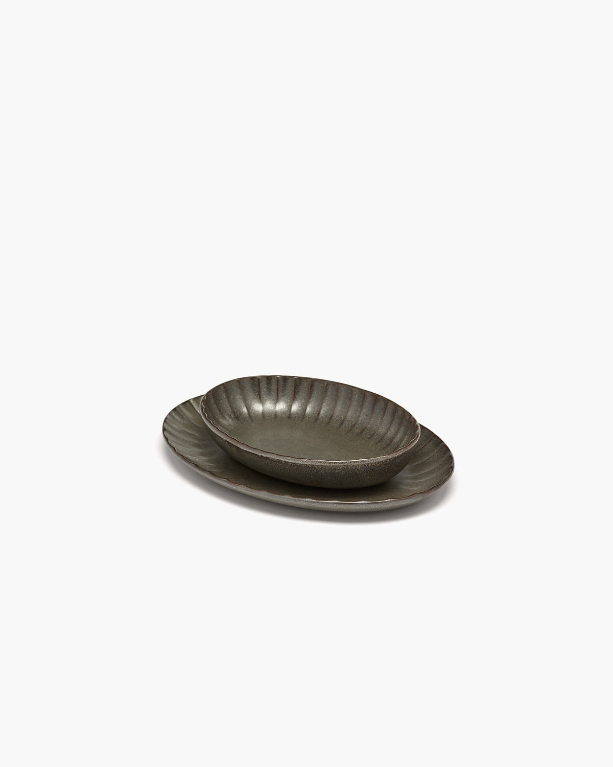 Serax Inku green oval bowl showing the reactive glaze
