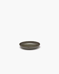 Small green Inku oval serving bowl by Sergio Herman for Serax on a white background