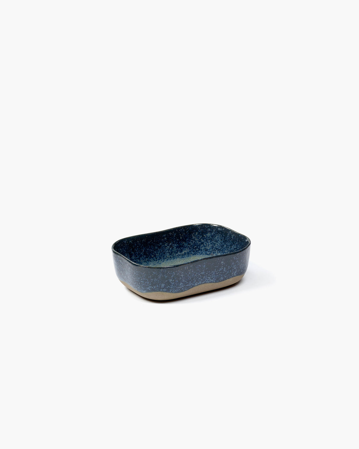Merci No.6 extra deep plate in blue stoneware for Serax on a white background