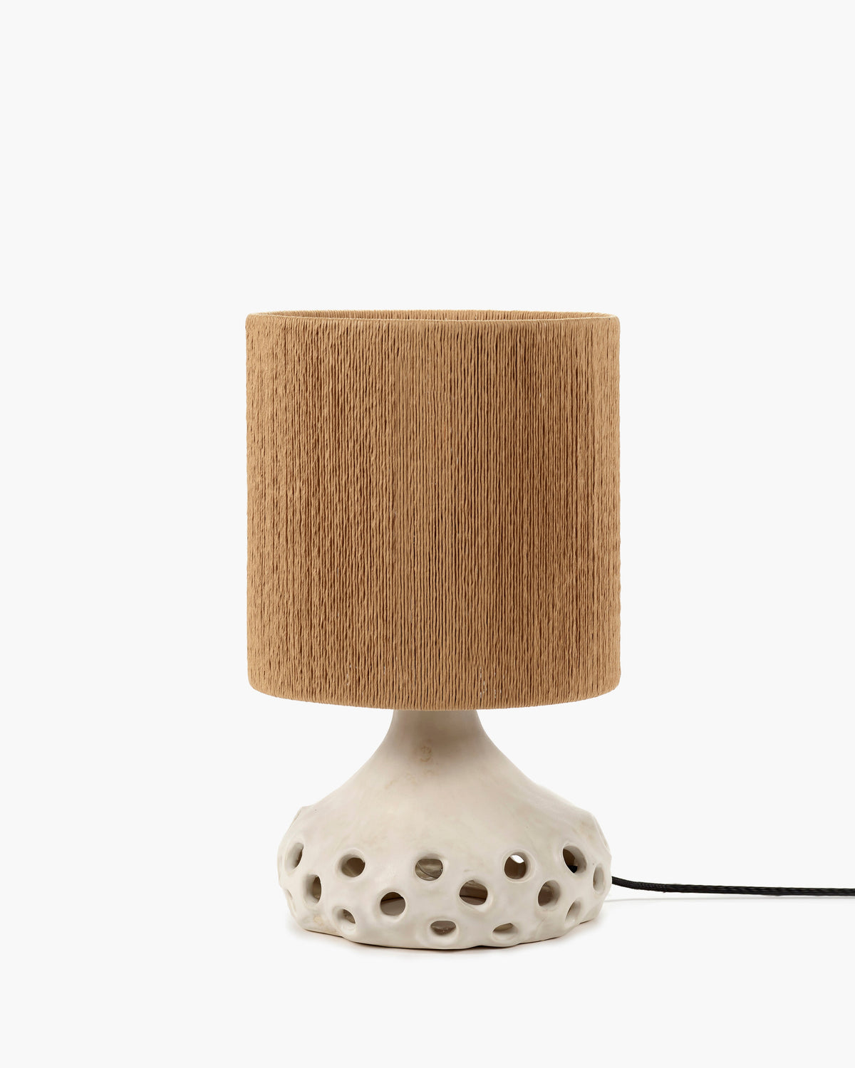 Oya stoneware table lamp by Sophie Casier for Serax with beige perforated base and brown shade