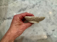Side profile of raised handmade ceramic soap dish for dry soap storage