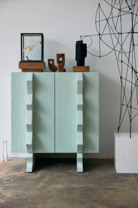 HKLIVING small burned wooden sculpture adding contrast to a modern cabinet display