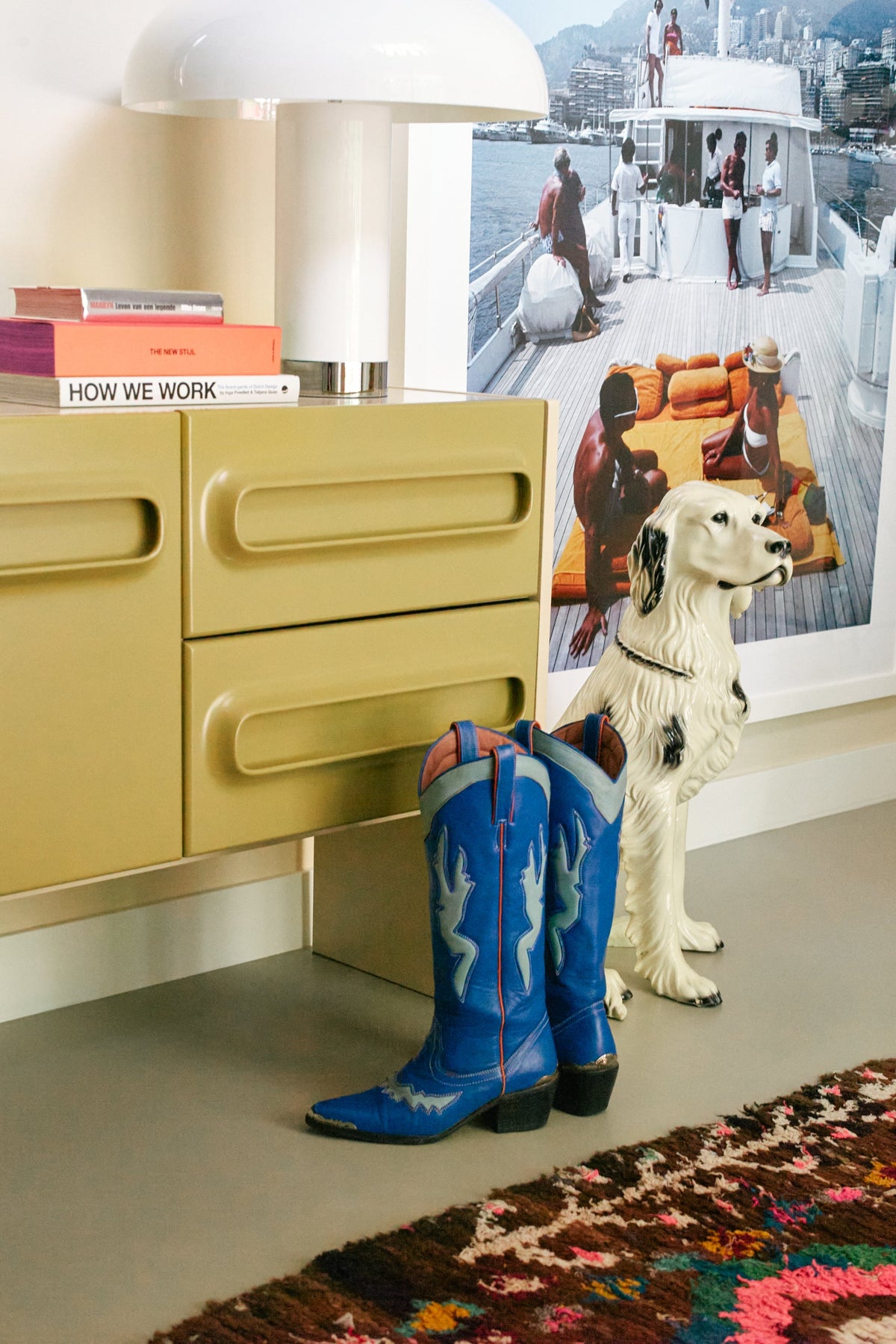 HKLIVING Space dresser in sage and cream styled with books, art and cowboy boots