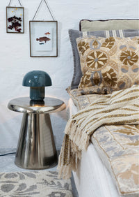 recycled cotton throw with off white and mustard stripes, folded with fringe
