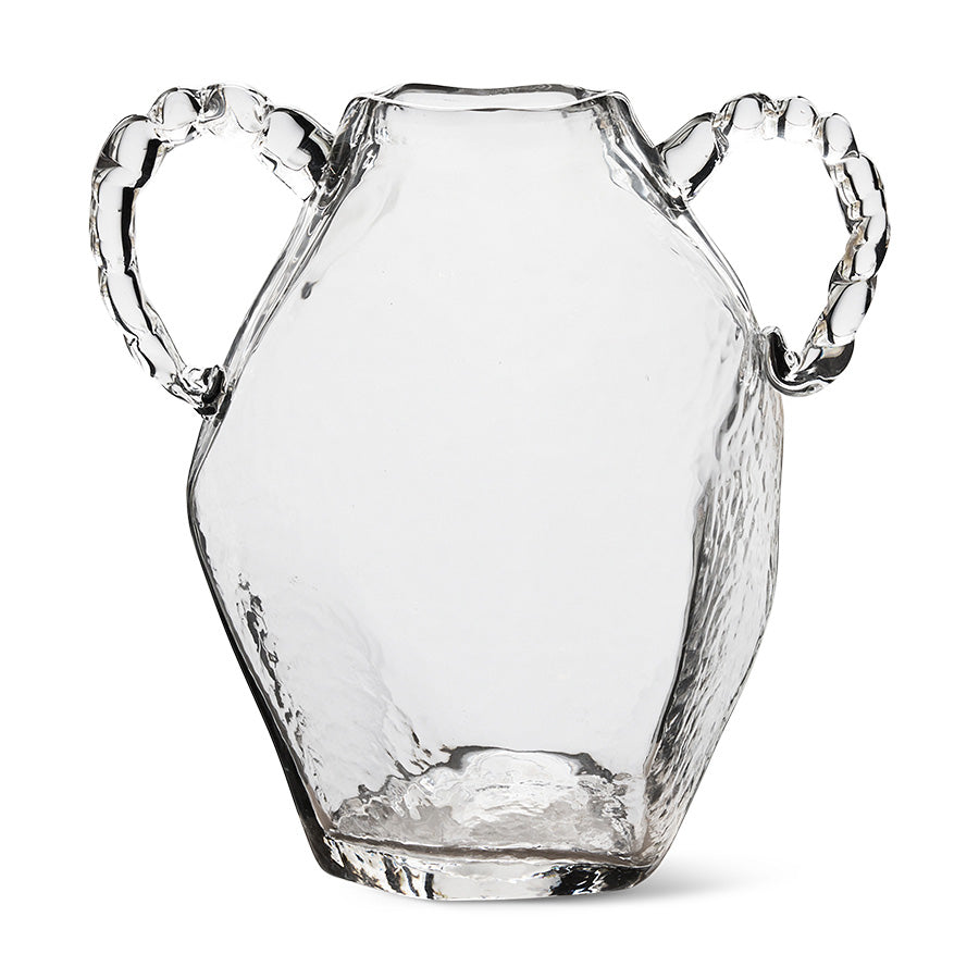 Clear glass amphora hkliving vase with twisted handles on white background