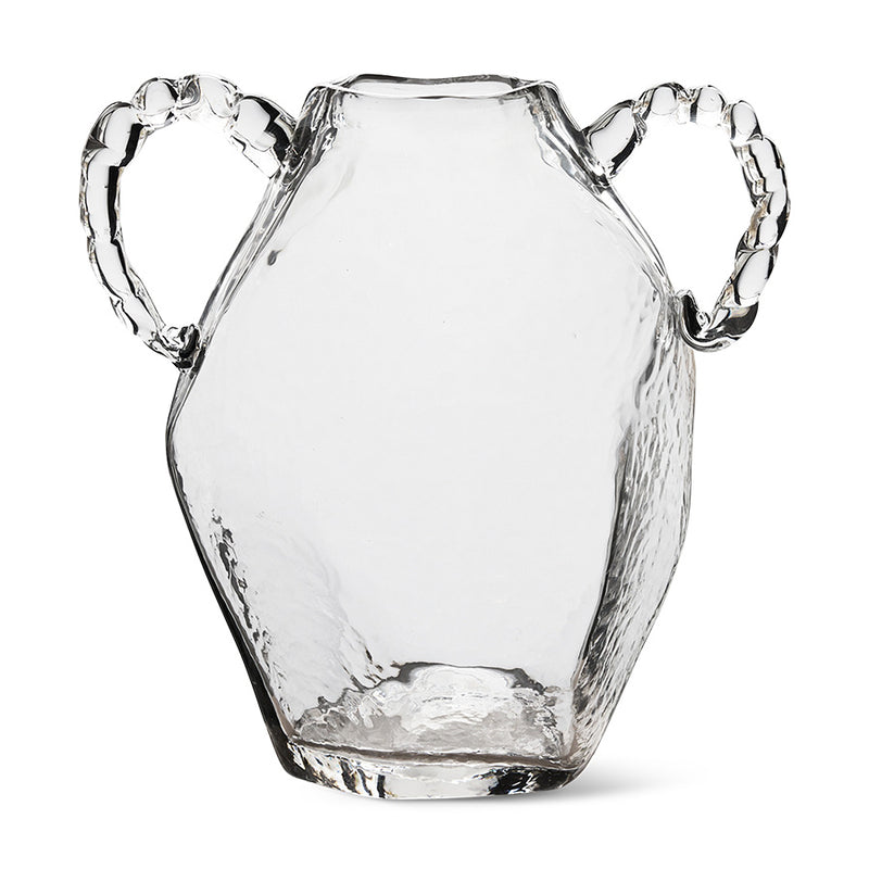 Clear glass amphora hkliving vase with twisted handles on white background