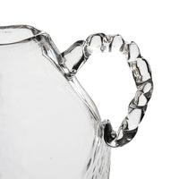 Alternate angle of clear glass amphora vase showing faceted body