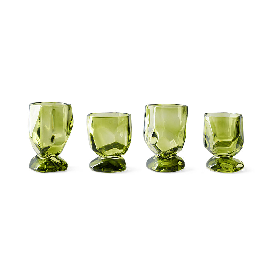 Set of four Nienke Sikkema for HKLIVING emerald green wine glasses on white background showing variation in size and form