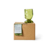 Single Nienke Sikkema for HKLIVING emerald green glass displayed on top of branded gift box