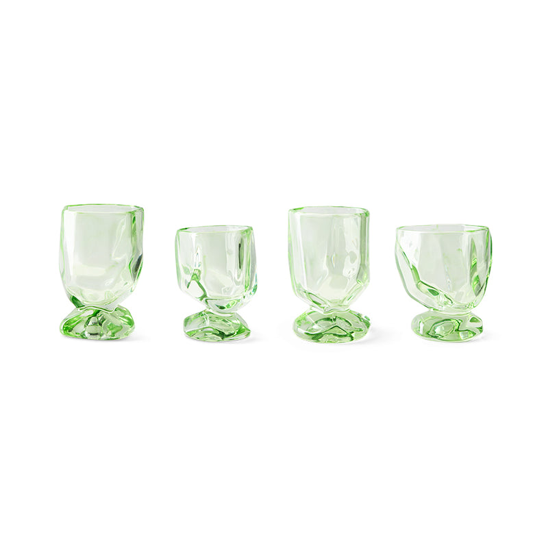 Set of four green hand-blown glasses with sculptural gem-like stems by hkliving