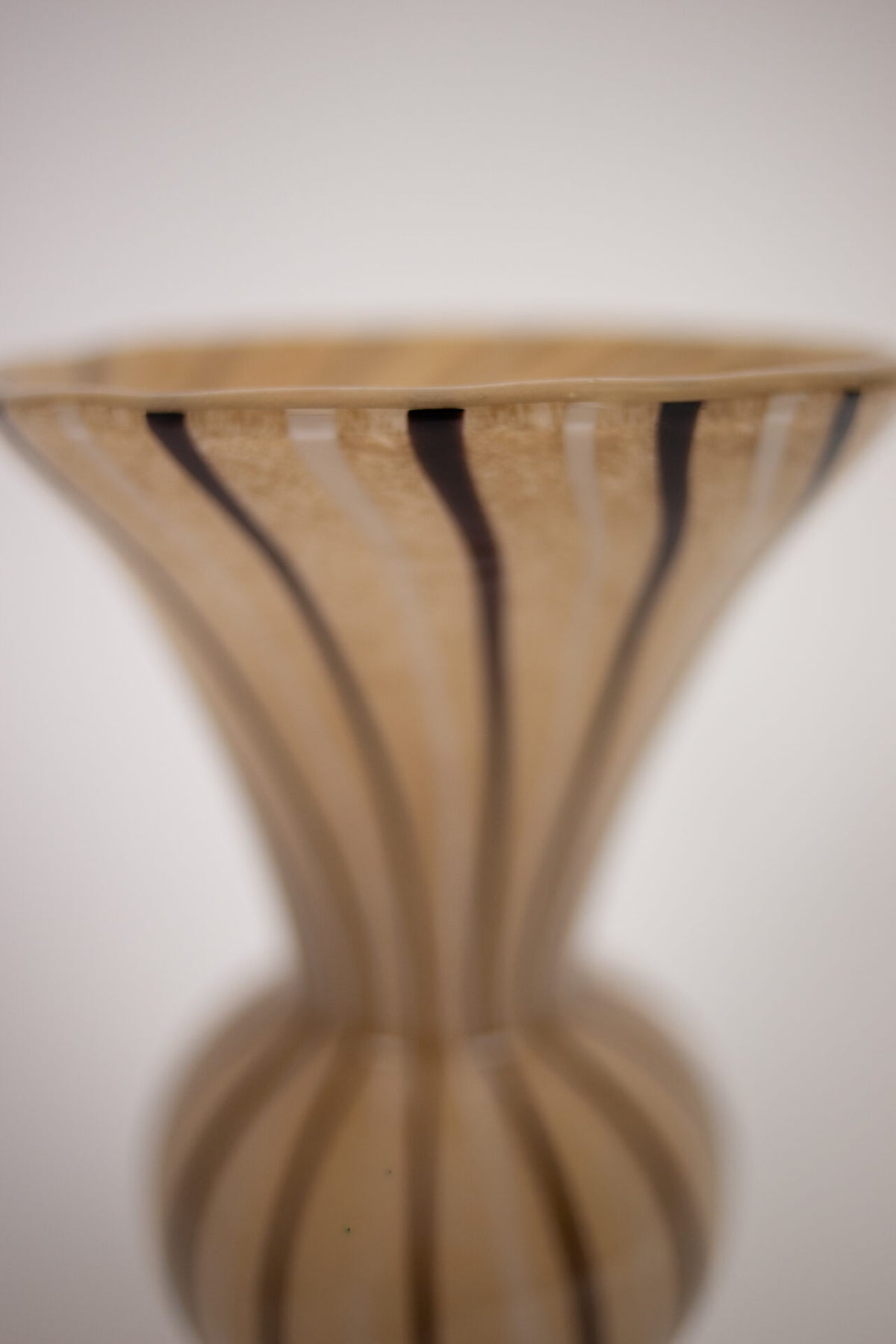 Close-up of the wavy rim and stripes on the Stria vase by Olsson & Jensen