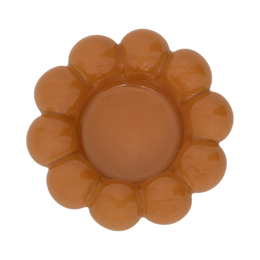 Talon flower-shaped tealight holder in golden orange by Urban Nature Culture, seen from above