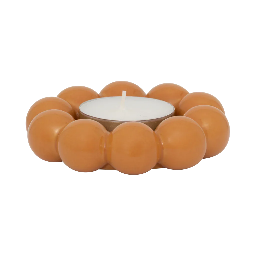 Talon golden orange flower candle holder with a tealight