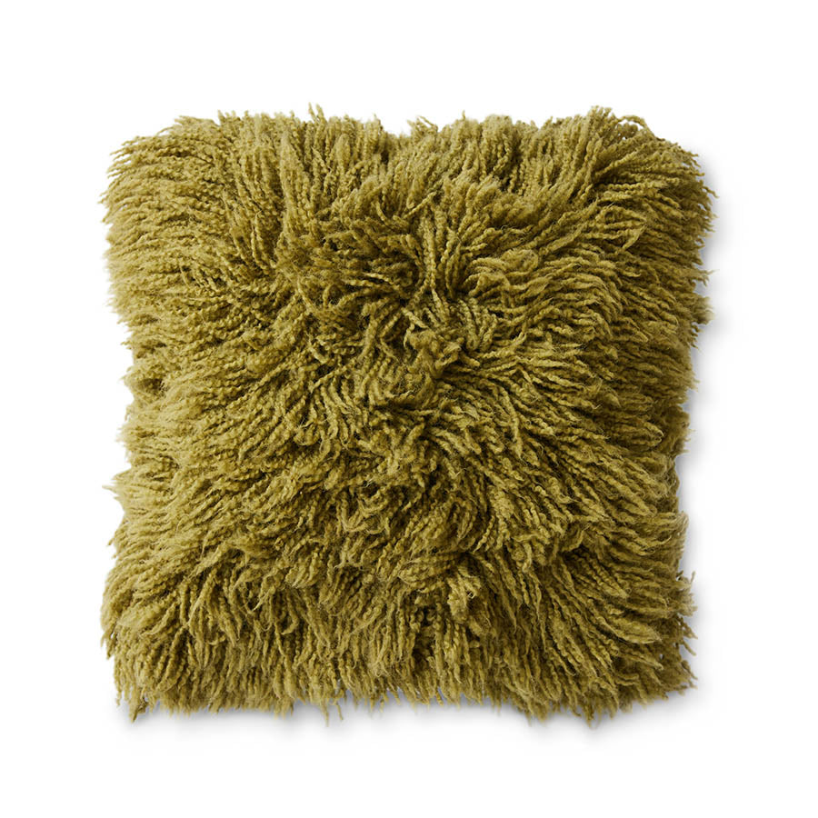 Green fluffy pillow by HKLIVING on a white background