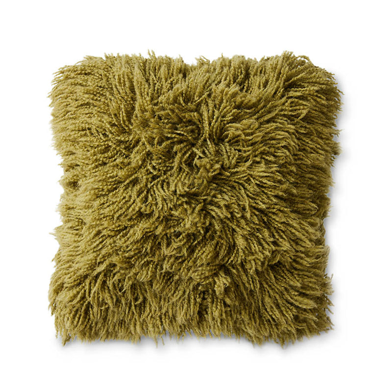 Green fluffy pillow by HKLIVING on a white background