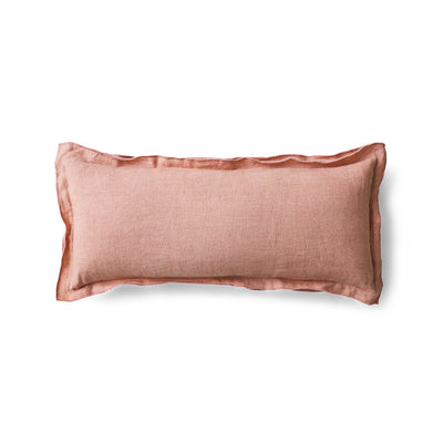 Dusty peach linen cushion on white background