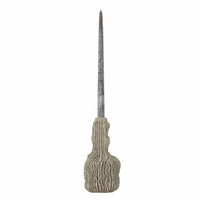Textured grey candlestick inspired by natural shapes