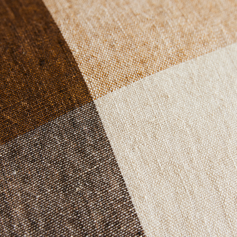 Close-up of fabrics of the HKLIVING cushion in brown, beige, and gray.