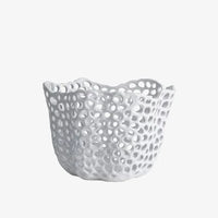 the decorative bowl by itself in a white room... or maybe it's just sat in the infinate void