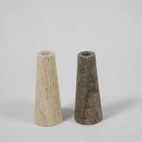 Pair of light and dark travertine cone candle holders by Olsson & Jensen