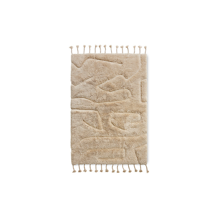 HKLIVING wool rug limitless in cream, flat lay on white background showing the tasselled ends and subtle woven pattern