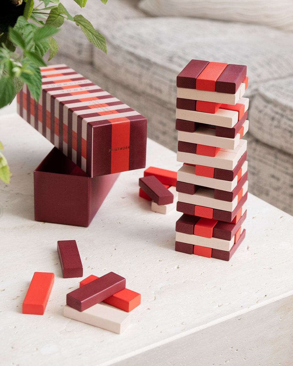 Tumbling Tower game styled on coffee table