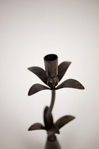Close-up of the flower-shaped cup on the Vireo candlestick by Olsson & Jensen