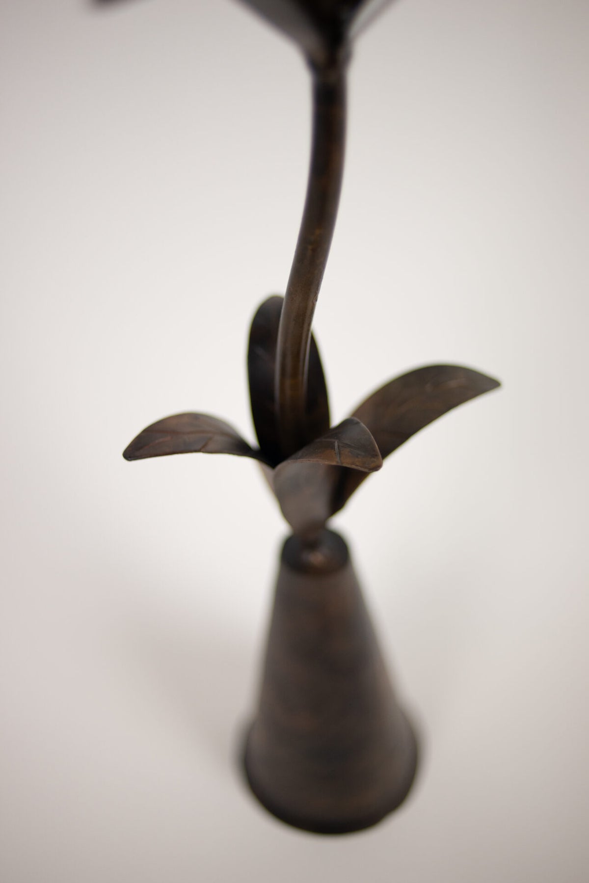 Close-up of the leaves and base of the Vireo candlestick by Olsson & Jensen