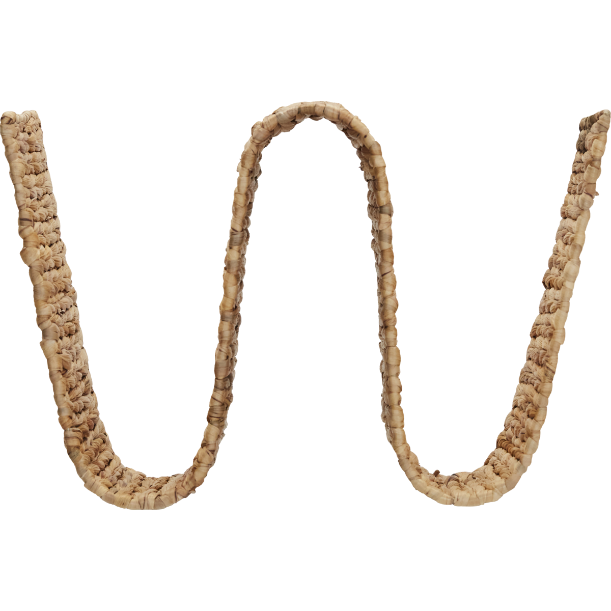 front view of wave-shaped magazine holder by house doctor in natural wicker
