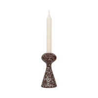 Zaria candle holder with an ivory dinner candle
