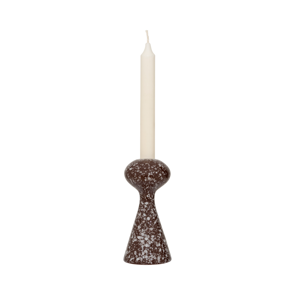 Zaria candle holder with an ivory dinner candle